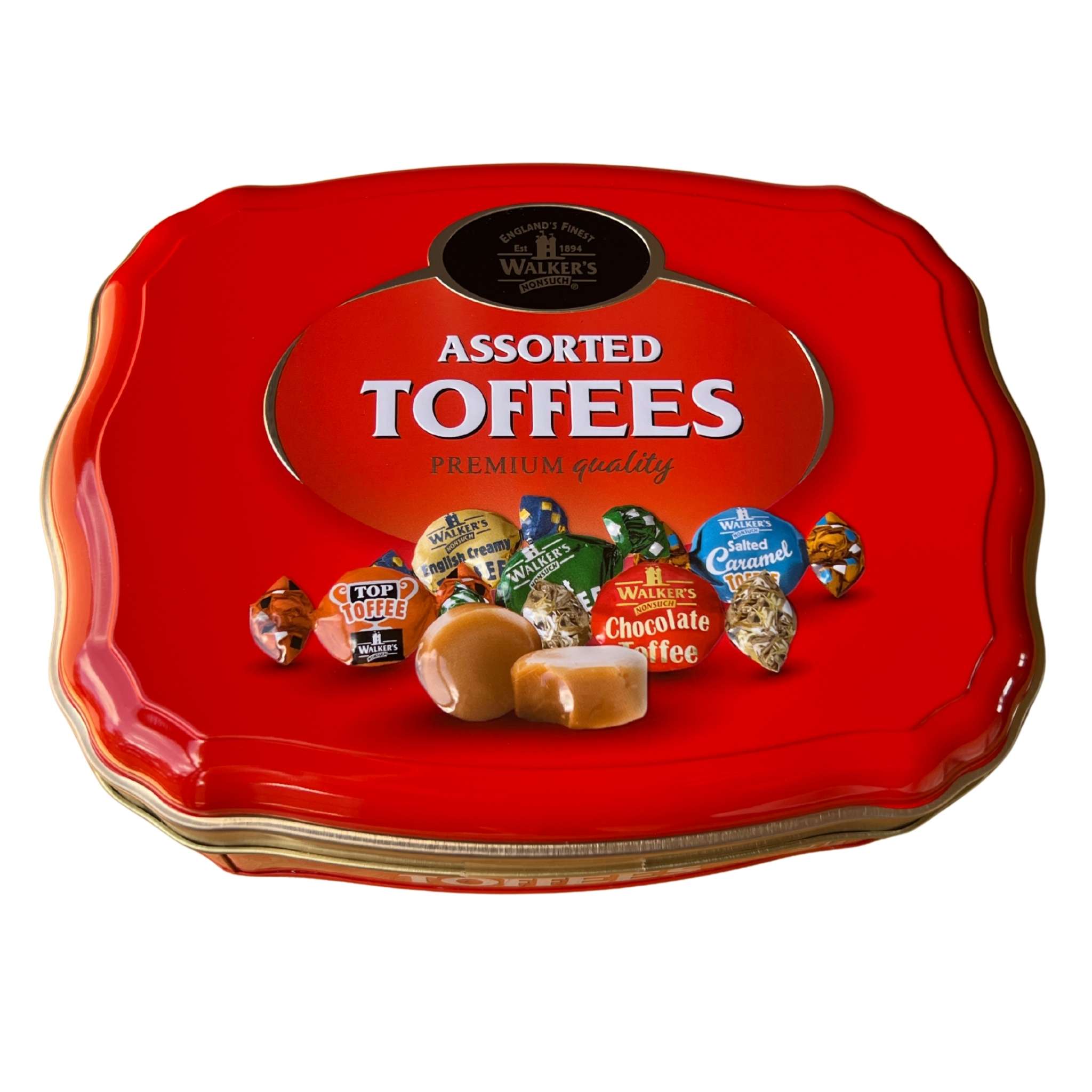 Walkers Nonsuch Assorted Toffees and Chocolate Eclairs collectible red tin 500g featuring assorted creamy toffee and milk chocolate eclairs.